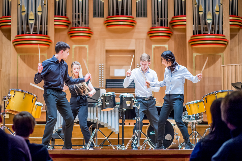 Percussion ensemble performing in front of the RCM organ